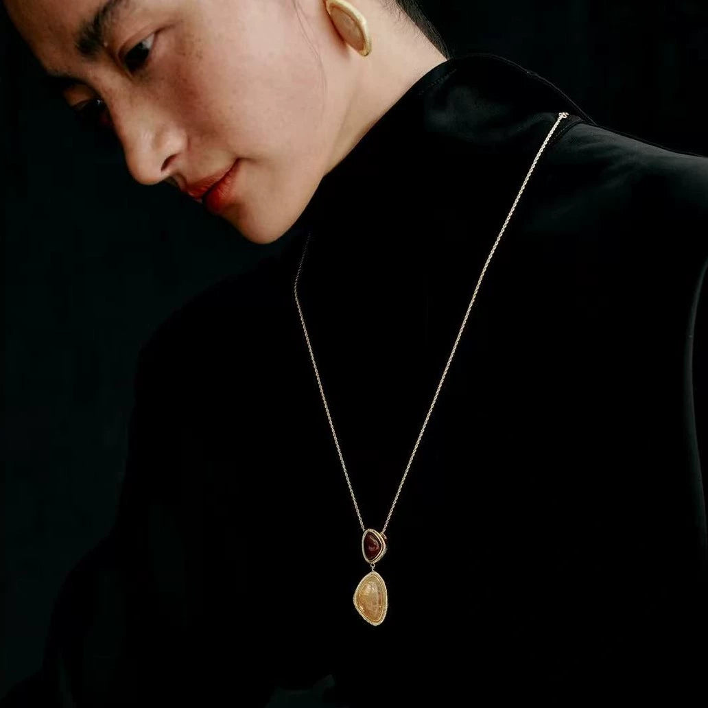 Model wearing the Bound Light natural stone long necklace details
