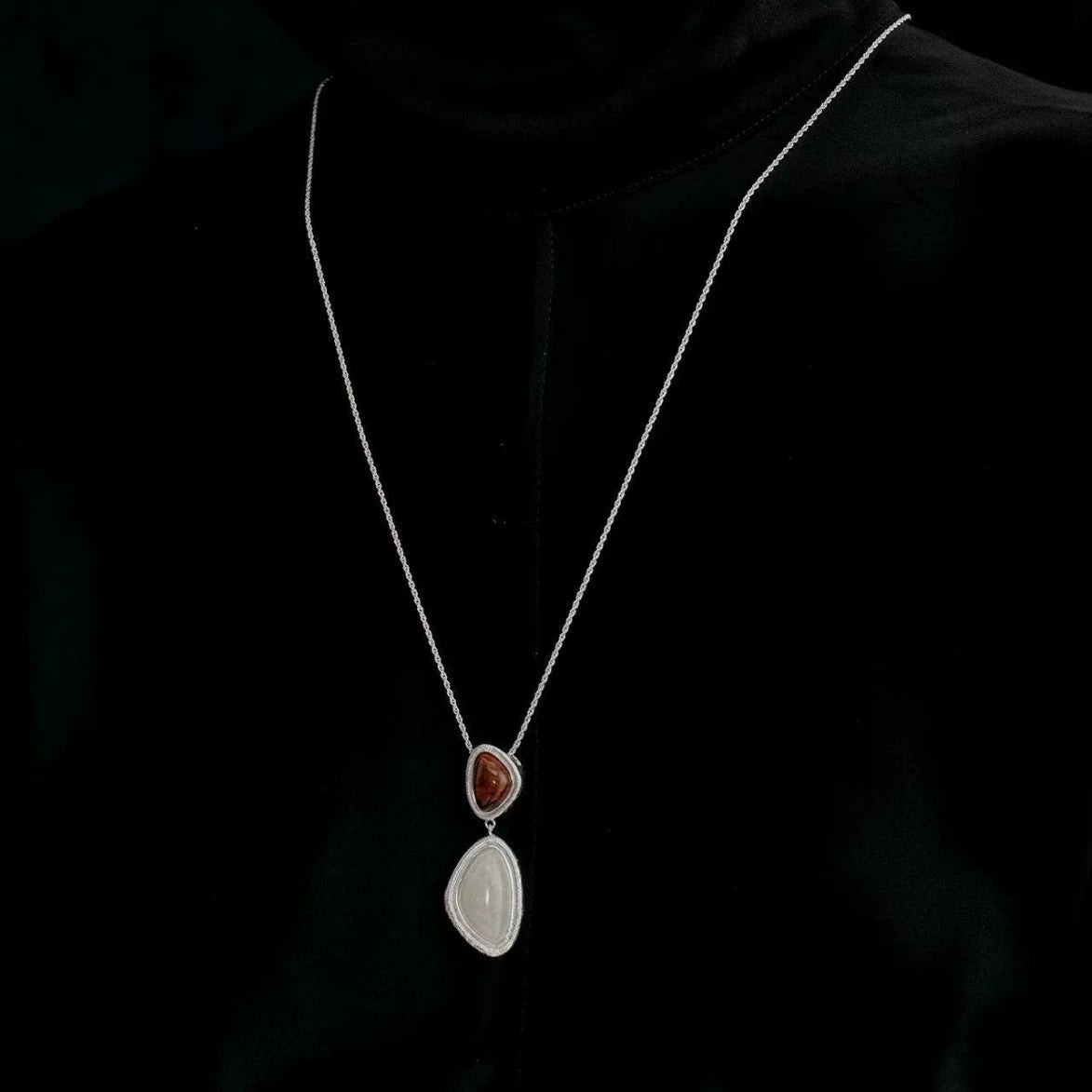 Model wearing the silver Bound Light long necklace