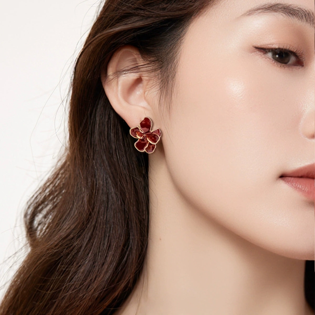 Model wearing Burgundy Floral Stud Earrings