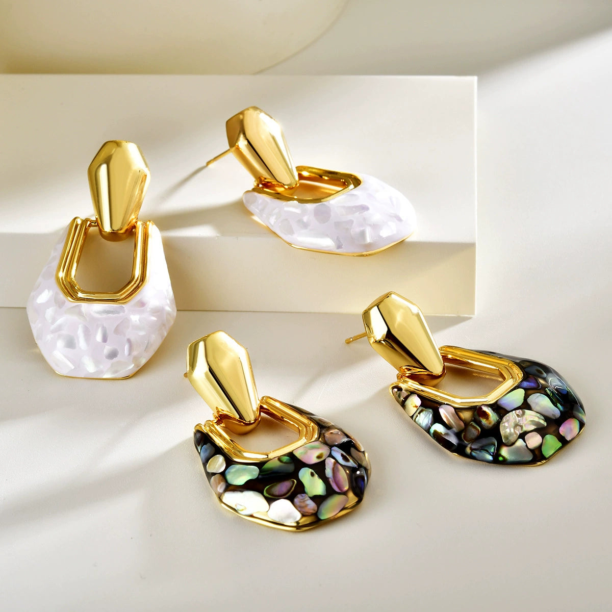 Geometric abalone shell drop earrings in black-back abalone, white-back abalone and white shell