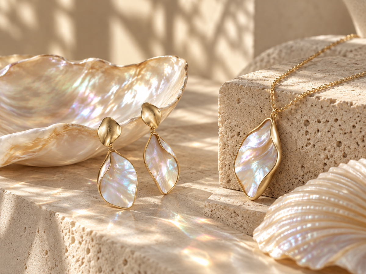 Mother-of-pearl jewelry highlighting luminous texture and natural iridescent reflections