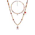 House Charm short and long mixed-stone necklaces styled as a layered set
