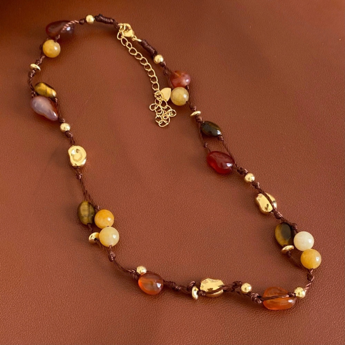Natural stone and gold-tone details on Jungle Fruit necklace