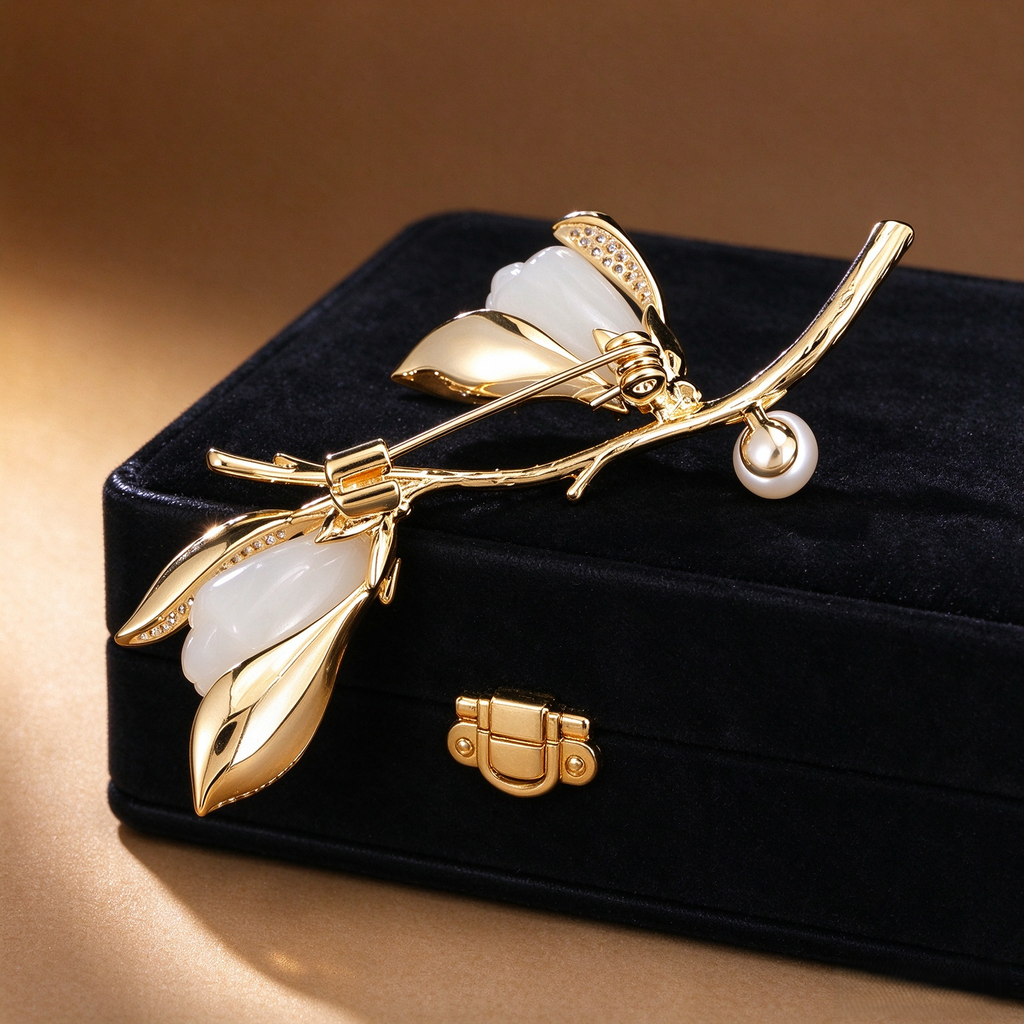 Magnolia pearl branch brooch measuring approximately 6.0 by 3.6 cm