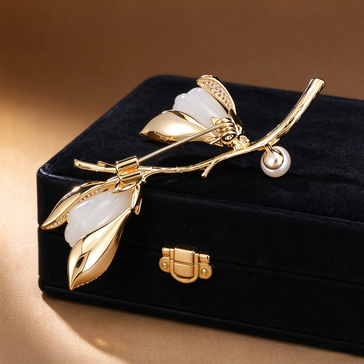 Magnolia pearl branch brooch measuring approximately 6.0 by 3.6 cm