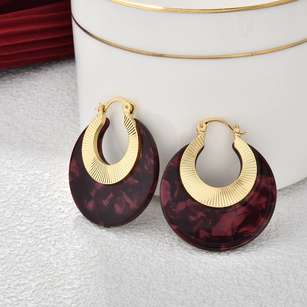 Round Burgundy acetate hoop earrings with textured gold-tone detail