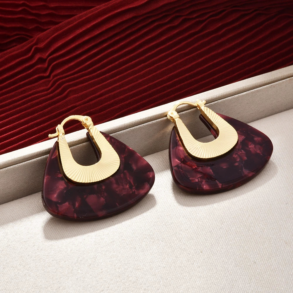 Triangle burgundy marbled acetate hoop earrings with gold-tone textured metal