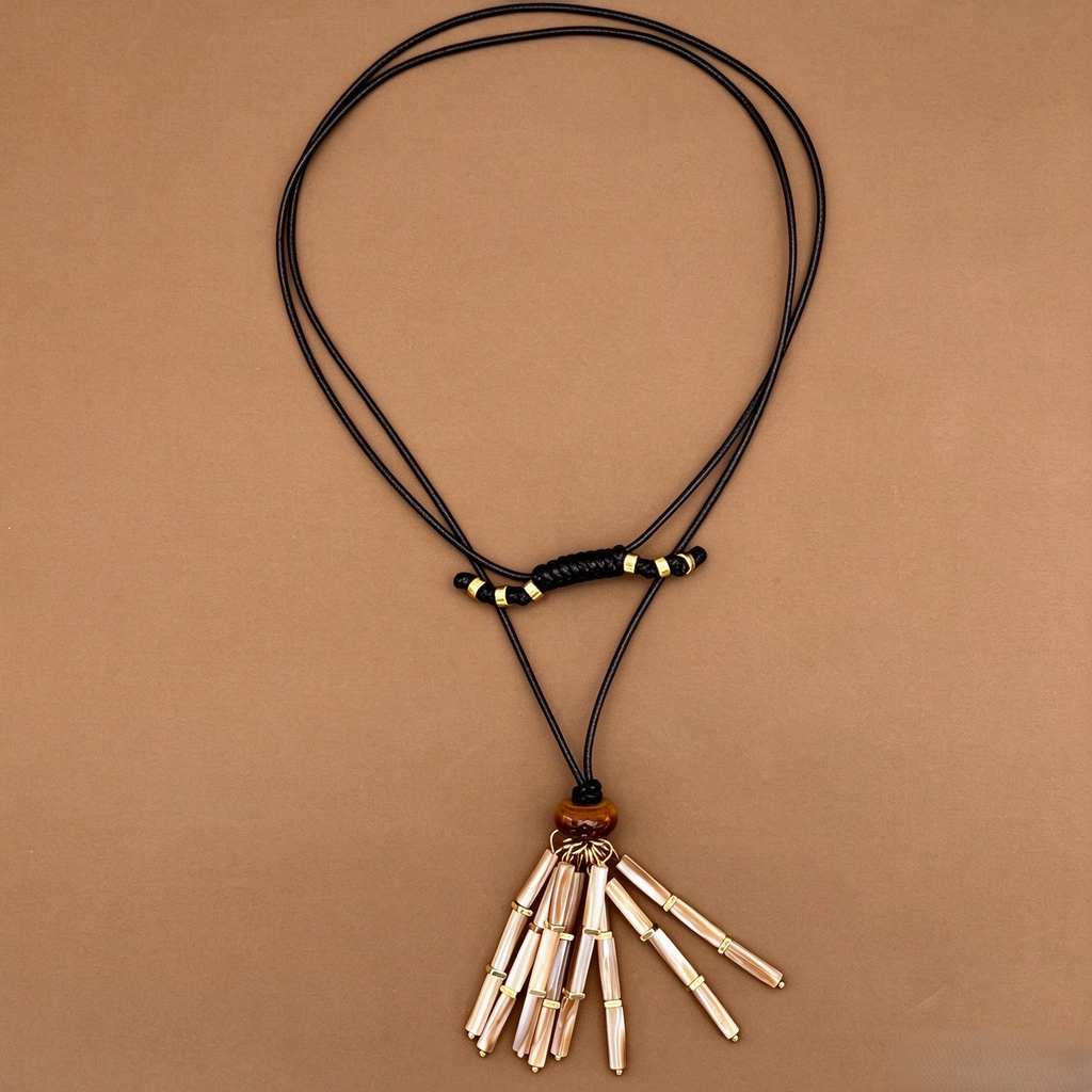 Long mother-of-pearl tassel necklace with black cord