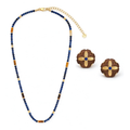 Motu Blue lapis and tiger eye beaded necklace with matching stud earrings on a white background