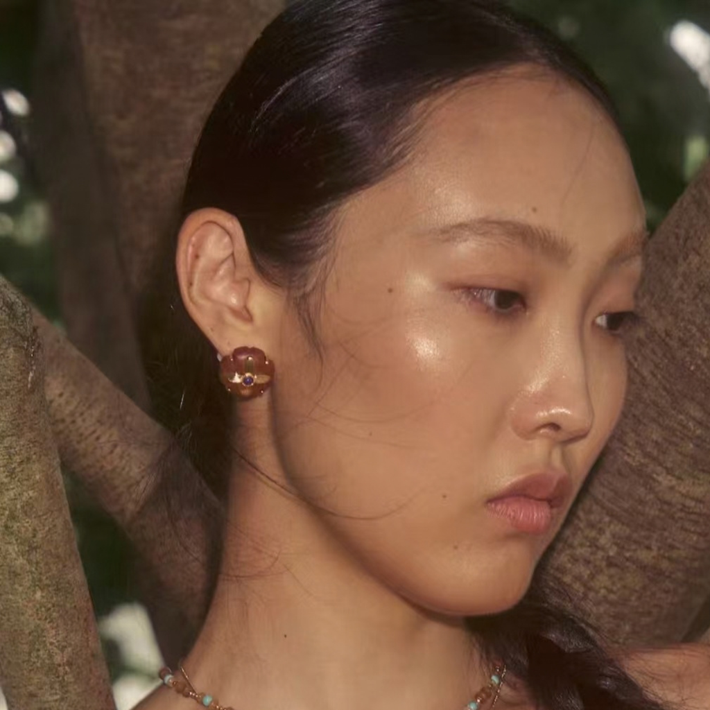 Model wearing Motu Blue wood and lapis stud earrings
