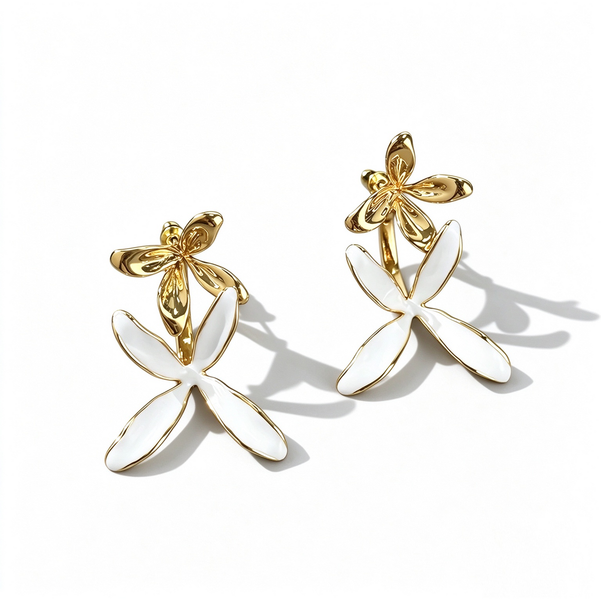 Sculptural Orchid stud earrings in white enamel and Gold-Tone