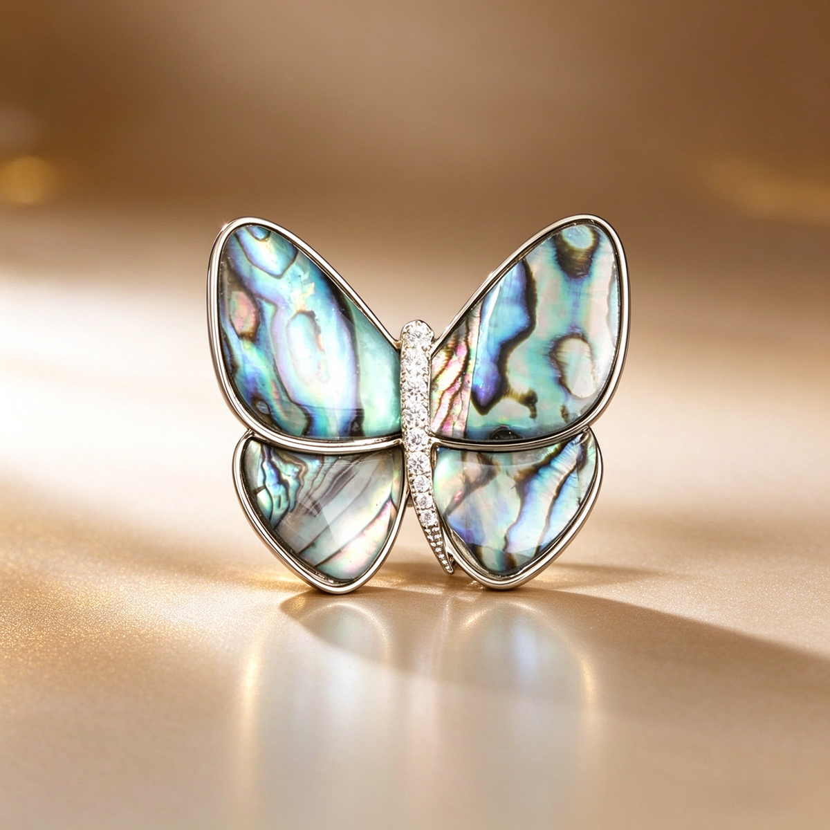 Abalone shell butterfly brooch with iridescent multicolor wings