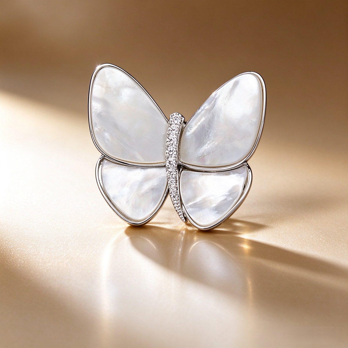 Silver-tone shell butterfly brooch with white shell inlay