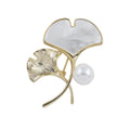 Shell ginkgo brooch in gold-tone with white shell leaf