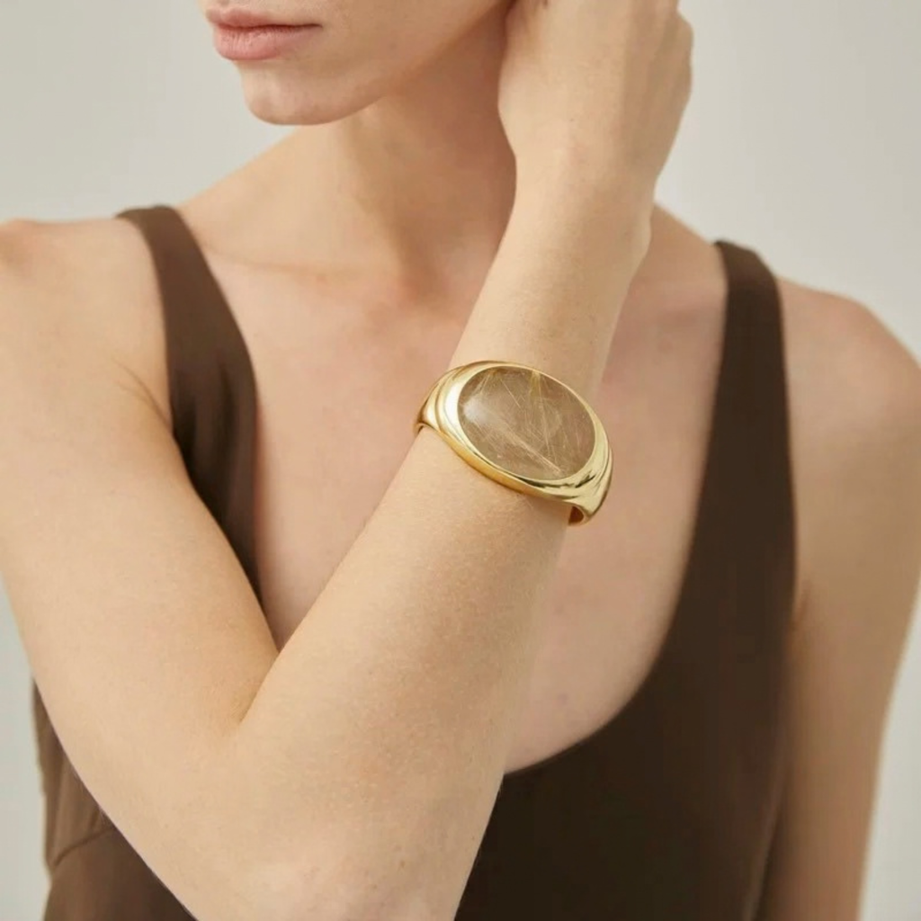 Sculptural smoky quartz cuff bracelet with gold-tone finish