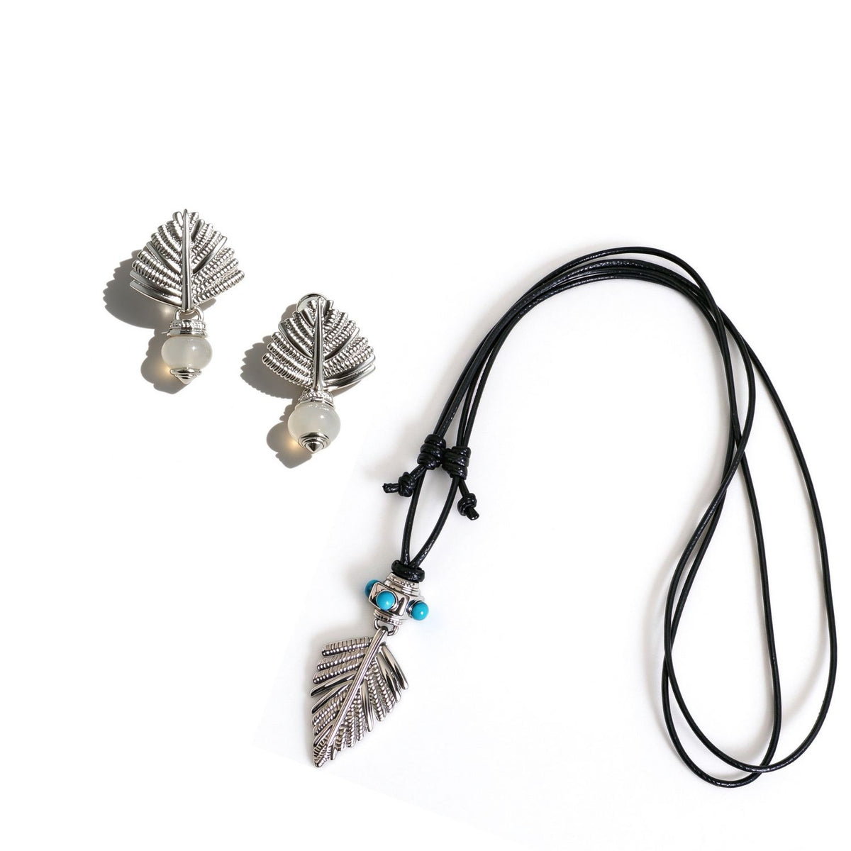 Swaying Palm silver-tone jewelry set with a turquoise pendant necklace and gray agate stud earrings
