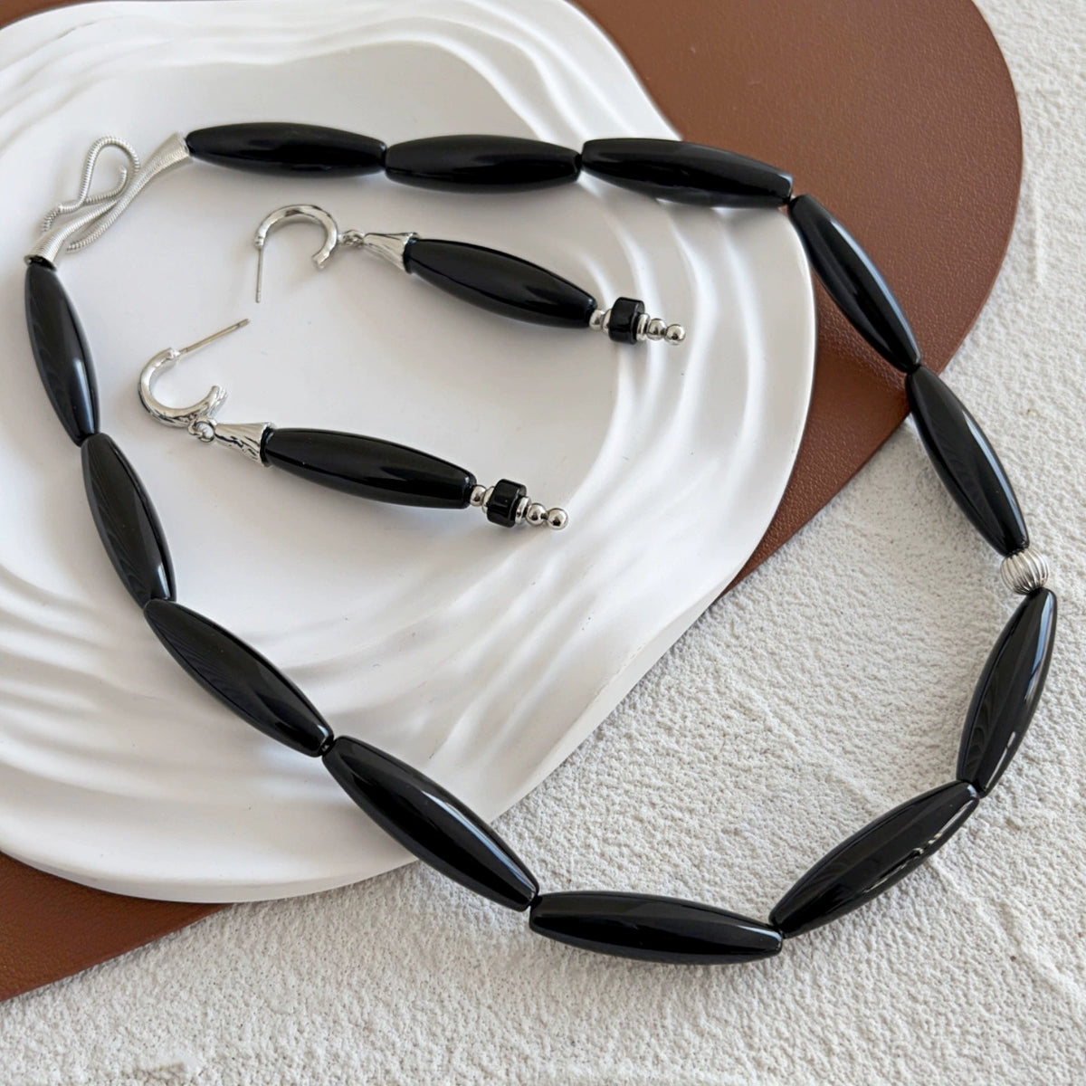 Black Onyx collar necklace and matching earrings styled together