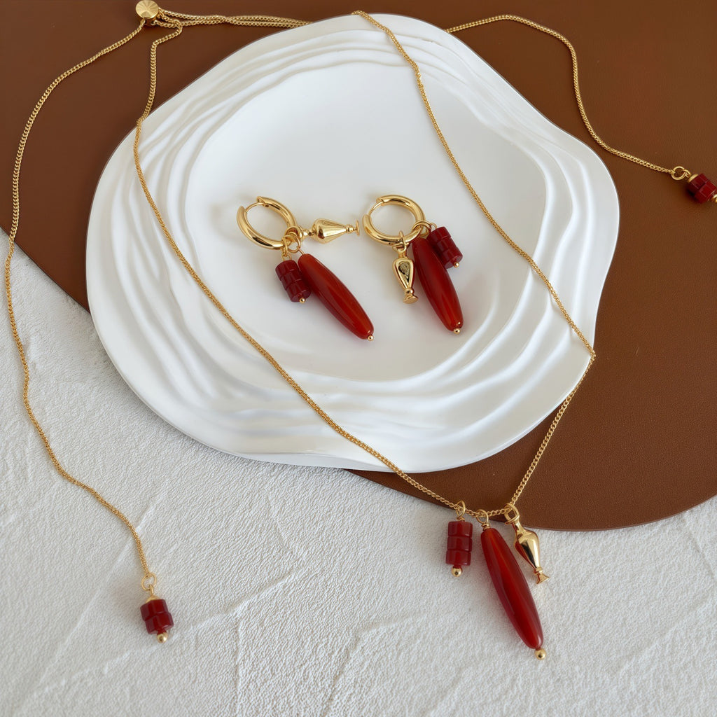 Vessel Red Agate long necklace and sculptural earrings styled together