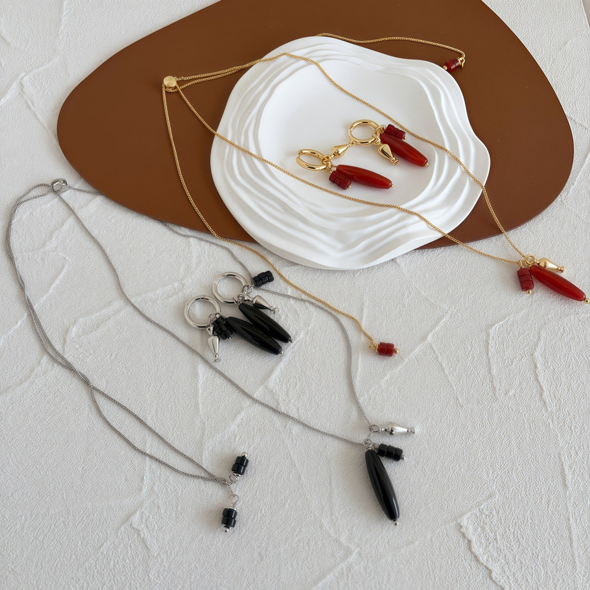 Vessel Agate Long Necklace and sculptural earrings styled together